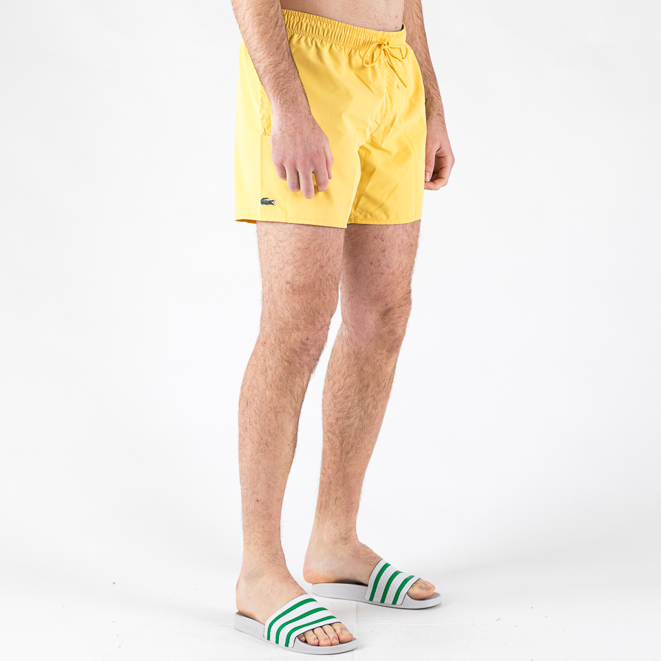 Yellow lacoste shorts sales