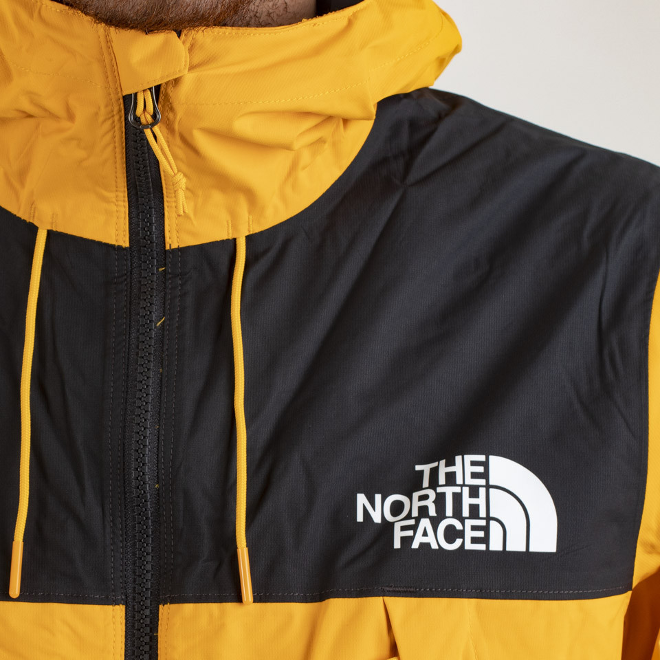 The north face 1990 mountain q jacket zinnia hot sale orange